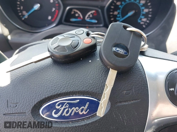 2013 Ford Escape SE with VIN 1FMCU9GX0DUC79114, listed as a IAAI auction lot 42237118 with 176,413 mi miles and . Bid and sale history available at DreamBid. Image 11.