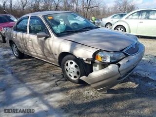 1999 Mercury Mystique GS with VIN 1MEFM6530XK635463, listed as a IAAI auction lot 41478903 with 87,911 mi miles. Bid and sale history available at carsss.com. Image 1.