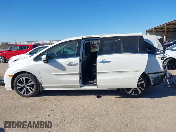 2018 Honda Odyssey Elite with VIN 5FNRL6H94JB065862, listed as a IAAI auction lot 41382127 with 101,774 mi miles and . Bid and sale history available at DreamBid. Image 14.