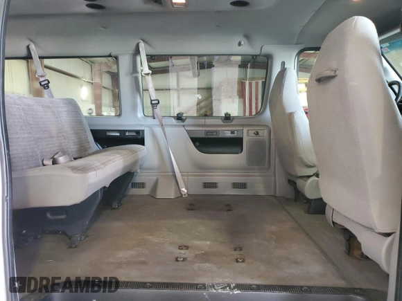 2002 Ford Econoline Passenger XL с VIN 1FBSS31S52HA39048, выставлен на аукционе Copart как лот 87632735 с пробегом 166 850 миль миль и Списание • Salvage title. История ставок и продаж доступна на DreamBid. Изображение 11.