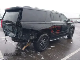 2017 Chevrolet Suburban Premier z VIN 1GNSKJKC4HR162261, wystawiony jako IAAI lot #41593672 z przebiegiem 100 136 mil mil oraz . Historia ofert i sprzedaży dostępna na DreamBid. Obrazek 4.