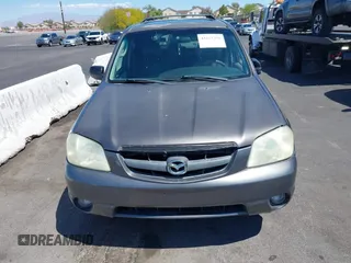 2003 Mazda Tribute ES with VIN 4F2CZ96113KM52877, listed as a IAAI auction lot 42217251 with 218,475 mi miles and . Bid and sale history available at DreamBid. Image 6.