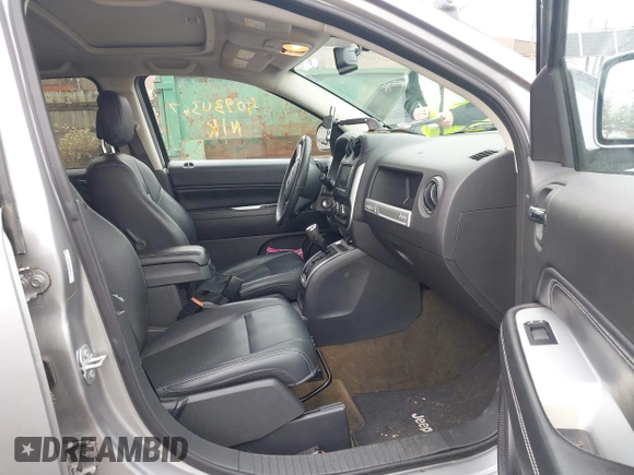 2016 Jeep Compass High Altitude Edition with VIN 1C4NJCEA2GD718173, listed as a IAAI auction lot 40930567 with 58,048 mi miles. Bid and sale history available at carsss.com. Image 5.