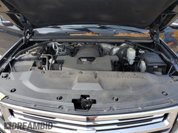2015 Chevrolet Suburban LTZ with VIN 1GNSKKKC1FR624679, listed as a Copart auction lot 52957365 with 71,194 mi miles and Salvage Title. Bid and sale history available at DreamBid. Image 12.