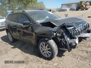 2016 Jeep Cherokee Limited z VIN 1C4PJMDS4GW124486, wystawiony jako IAAI lot #40503562 z przebiegiem 106 600 mil mil oraz . Historia ofert i sprzedaży dostępna na DreamBid. Obrazek 1.