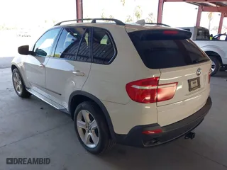 2007 BMW X5 3.0si with VIN 5UXFE43507L018015, listed as a IAAI auction lot 41880668 with 150,329 mi miles. Bid and sale history available at carsss.com. Image 3.