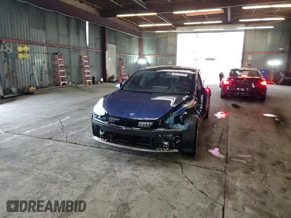 2023 Tesla Model 3 z VIN 5YJ3E1EA9PF548452, wystawiony jako Copart lot #44771515 z przebiegiem 19 903 mil mil oraz Szkoda całkowita • Salvage title. Historia ofert i sprzedaży dostępna na DreamBid. Obrazek 11.