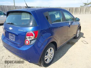 2013 Chevrolet Sonic LT with VIN 1G1JC6SG5D4220315, listed as a IAAI auction lot 41853166 with 69,970 mi miles. Bid and sale history available at carsss.com. Image 4.
