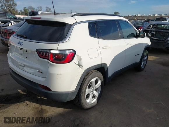 2019 Jeep Compass Latitude with VIN 3C4NJCBB2KT743820, listed as a IAAI auction lot 41692314 with 50,030 mi miles. Bid and sale history available at carsss.com. Image 4.