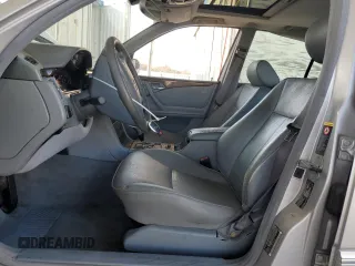 2002 Mercedes-Benz E-Class with VIN WDBJF65J12B488632, listed as a Copart auction lot 87060504 with 273,135 mi miles and Salvage Title. Bid and sale history available at carsss.com. Image 7.