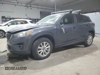 2016 Mazda CX-5 Touring z VIN JM3KE4CY5G0714839, wystawiony jako Copart lot #41434655 z przebiegiem 267 157 mil mil oraz Szkoda całkowita • Salvage title. Historia ofert i sprzedaży dostępna na DreamBid. Obrazek 1.