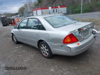 2002 Toyota Avalon XL with VIN 4T1BF28B12U234616, listed as a IAAI auction lot 41954288 with 148,418 mi miles. Bid and sale history available at carsss.com. Image 3.