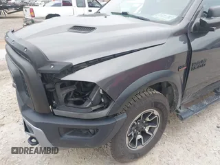 2017 Ram 1500 Rebel with VIN 1C6RR7YT5HS610293, listed as a IAAI auction lot 42454064 with 103,515 mi miles and . Bid and sale history available at DreamBid. Image 6.