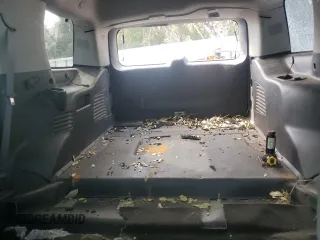 2015 Chevrolet Tahoe z VIN 1GNSK3EC3FR305401, wystawiony jako Copart lot #80819994 z przebiegiem Nie podano mil oraz Szkoda całkowita • Salvage title. Historia ofert i sprzedaży dostępna na DreamBid. Obrazek 10.