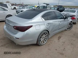 2014 Infiniti Q50 with VIN JN1BV7AP0EM681679, listed as a IAAI auction lot 41371773 with 141,940 mi miles. Bid and sale history available at carsss.com. Image 4.