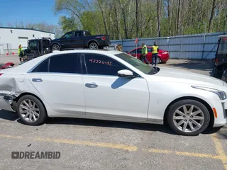 2015 Cadillac CTS Luxury AWD z VIN 1G6AX5SX5F0103725, wystawiony jako IAAI lot #42226485 z przebiegiem 112 437 mil mil oraz . Historia ofert i sprzedaży dostępna na DreamBid. Obrazek 13.