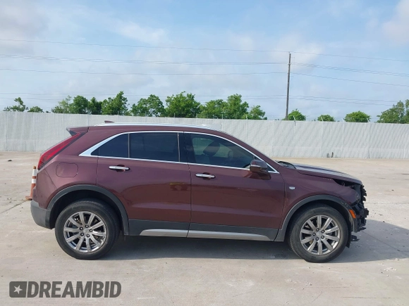 2023 Cadillac XT4 FWD Premium Luxury with VIN 1GYFZCR47PF106017, listed as a IAAI auction lot 42283401 with 40,734 mi miles and . Bid and sale history available at DreamBid. Image 13.