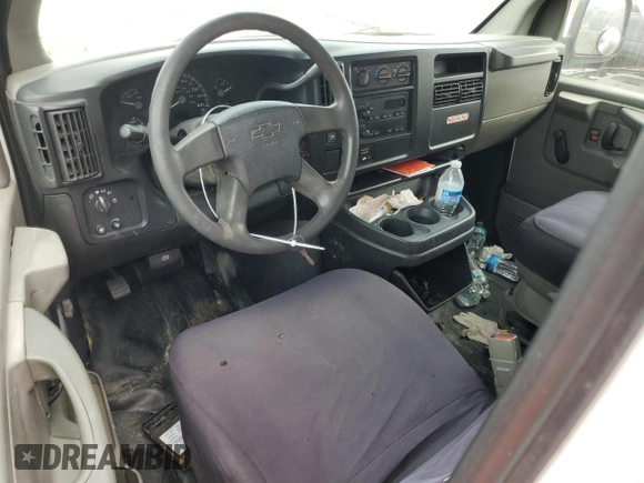 2003 Chevrolet Express Cargo with VIN 1GCGG25V931223419, listed as a Copart auction lot 76194064 with Not Provided miles and Salvage Title. Bid and sale history available at DreamBid. Image 8.