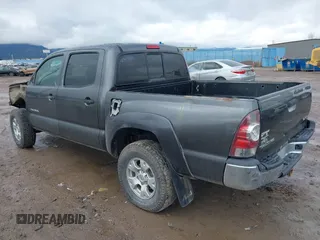 2013 Toyota Tacoma with VIN 3TMLU4EN7DM113315, listed as a IAAI auction lot 41938415 with 228,912 mi miles and . Bid and sale history available at DreamBid. Image 3.