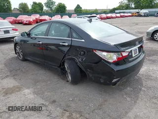 2014 Hyundai Sonata Limited z VIN 5NPEC4AB9EH886849, wystawiony jako IAAI lot #42274735 z przebiegiem 118 089 mil mil oraz . Historia ofert i sprzedaży dostępna na DreamBid. Obrazek 3.