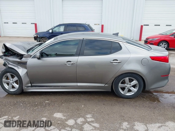 2015 Kia Optima LX z VIN 5XXGM4A78FG382856, wystawiony jako IAAI lot #42170669 z przebiegiem 101 964 mil mil oraz . Historia ofert i sprzedaży dostępna na DreamBid. Obrazek 14.