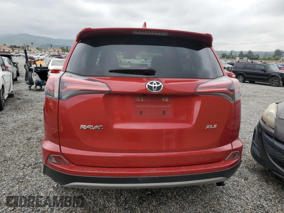 2017 Toyota RAV4 XLE with VIN JTMWFREV9HJ146162, listed as a Copart auction lot 56024955 with 147,802 mi miles and Salvage Title. Bid and sale history available at DreamBid. Image 6.