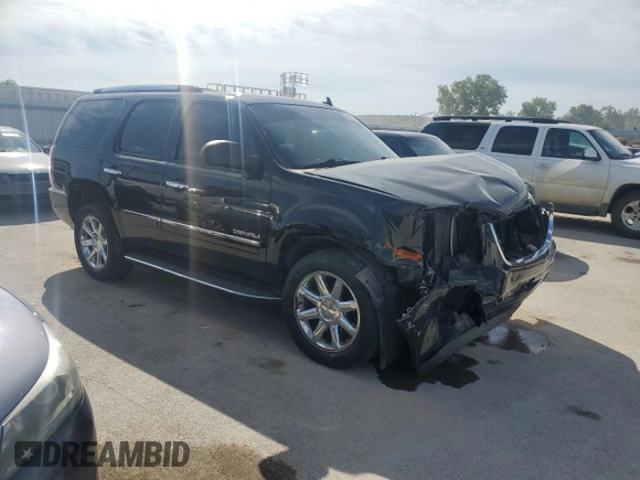 2014 GMC Yukon Denali with VIN 1GKS2EEF6ER137805, listed as a Copart auction lot 69835144 with 167,244 mi miles and Salvage Title. Bid and sale history available at carsss.com. Image 4.
