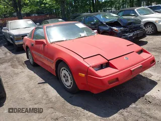 1986 Nissan 300ZX z VIN JN1HZ14S4GX164916, wystawiony jako IAAI lot #42295717 z przebiegiem 254 114 mil mil oraz . Historia ofert i sprzedaży dostępna na DreamBid. Obrazek 1.
