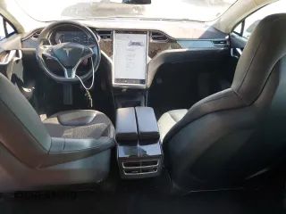 2016 Tesla Model S 70 with VIN 5YJSA1E17GF123934, listed as a Copart auction lot 55202865 with 132,027 mi miles and Salvage title. Bid and sale history available at DreamBid. Image 8.