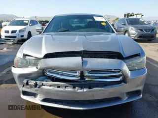 2013 Dodge Charger SE z VIN 2C3CDXBG0DH690682, wystawiony jako IAAI lot #42271976 z przebiegiem 161 176 mil mil oraz . Historia ofert i sprzedaży dostępna na DreamBid. Obrazek 12.