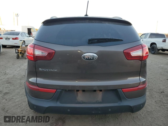 2013 Kia Sportage LX z VIN KNDPB3A23D7465413, wystawiony jako Copart lot #79964134 z przebiegiem 122 467 mil mil oraz Szkoda całkowita • Salvage title. Historia ofert i sprzedaży dostępna na DreamBid. Obrazek 6.