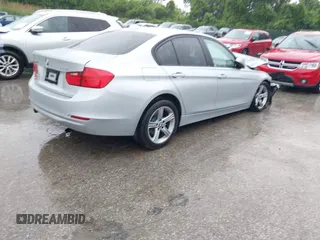 2013 BMW 3 Series 328i xDrive with VIN WBA3B5G56DNS05222, listed as a IAAI auction lot 42351739 with 98,399 mi miles and . Bid and sale history available at DreamBid. Image 4.