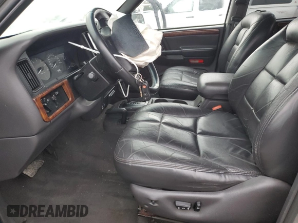 1997 Jeep Grand Cherokee Limited with VIN 1J4GZ78Y4VC693193, listed as a Copart auction lot 46327885 with 235,553 mi miles and Salvage Title. Bid and sale history available at carsss.com. Image 7.