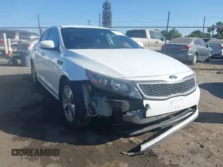 2015 Kia Optima EX with VIN KNAGN4ADXF5080067, listed as a IAAI auction lot 42292636 with 125,922 mi miles and . Bid and sale history available at DreamBid. Image 1.