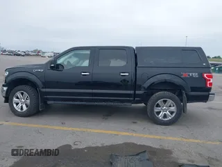 2018 Ford F-150 XL with VIN 1FTEW1E5XJKC37082, listed as a IAAI auction lot 42335721 with 167,401 mi miles and . Bid and sale history available at DreamBid. Image 13.