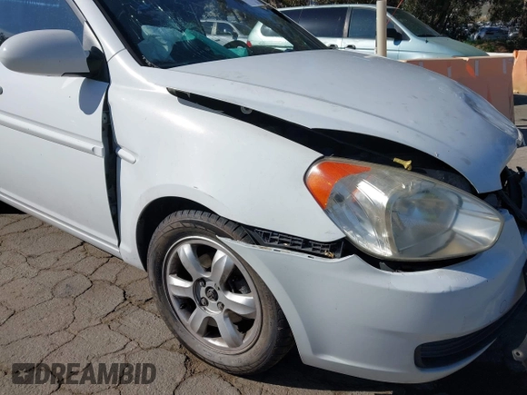 2006 Hyundai Accent GLS with VIN KMHCN46C36U040545, listed as a IAAI auction lot 42021545 with 224,058 mi miles. Bid and sale history available at carsss.com. Image 13.