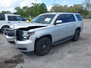 2018 Chevrolet Tahoe LT with VIN 1GNSCBKCXJR367852, listed as a IAAI auction lot 41549304 with 151,684 mi miles and . Bid and sale history available at DreamBid. Image 2.