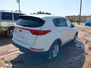2019 Kia Sportage LX with VIN KNDPM3AC3K7536691, listed as a IAAI auction lot 41733413 with 77,095 mi miles. Bid and sale history available at carsss.com. Image 4.