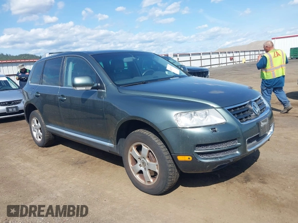 2004 Volkswagen Touareg with VIN WVGEM77L54D061132, listed as a IAAI auction lot 42127905 with 146,801 mi miles and . Bid and sale history available at DreamBid. Image 1.