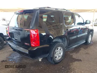2008 GMC Yukon SLT w/4SB with VIN 1GKFK13068J200767, listed as a IAAI auction lot 42005014 with 297,242 mi miles. Bid and sale history available at carsss.com. Image 4.