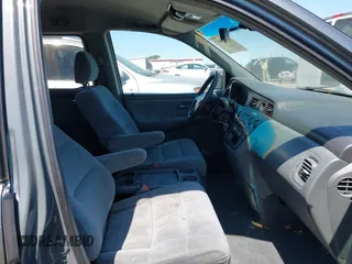 2001 Honda Odyssey EX z VIN 2HKRL18621H541553, wystawiony jako IAAI lot #42469447 z przebiegiem 241 701 mil mil oraz . Historia ofert i sprzedaży dostępna na DreamBid. Obrazek 5.