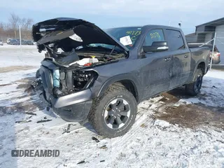 2022 Ram 1500 Rebel z VIN 1C6SRFLT9NN204868, wystawiony jako IAAI lot #41351273 z przebiegiem 67 120 mil mil oraz . Historia ofert i sprzedaży dostępna na DreamBid. Obrazek 17.