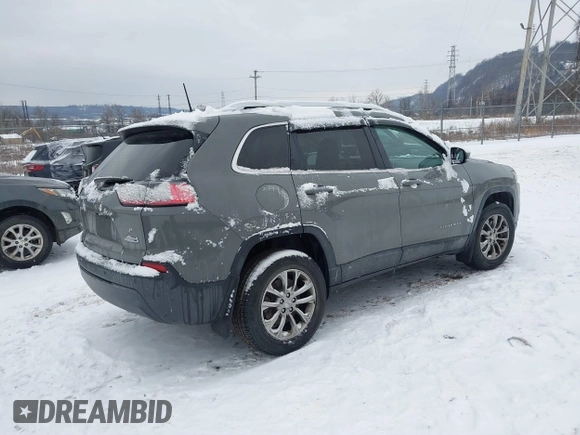 2019 Jeep Cherokee Latitude Plus with VIN 1C4PJMLB9KD399289, listed as a IAAI auction lot 41314743 with 84,726 mi miles. Bid and sale history available at carsss.com. Image 4.