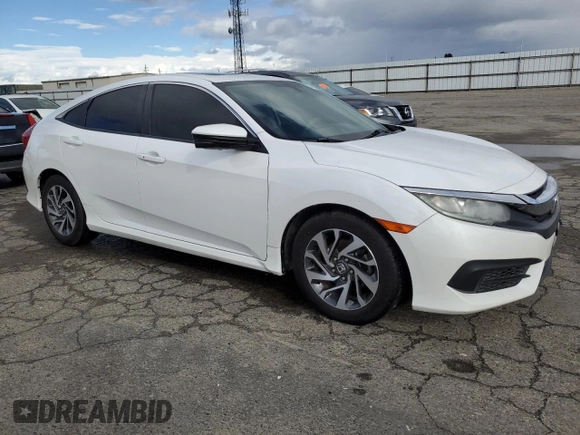 2018 Honda Civic EX with VIN 2HGFC2F70JH575845, listed as a Copart auction lot 45044455 with 220,969 mi miles and Salvage Title. Bid and sale history available at DreamBid. Image 4.