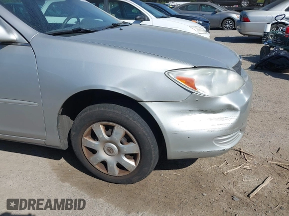2004 Toyota Camry LE with VIN 4T1BE32K74U350908, listed as a IAAI auction lot 42099989 with 120,971 mi miles. Bid and sale history available at carsss.com. Image 6.