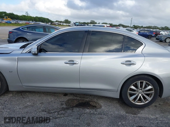 2015 Infiniti Q50 Premium with VIN JN1BV7AP9FM358782, listed as a IAAI auction lot 41103963 with 96,853 mi miles. Bid and sale history available at carsss.com. Image 15.