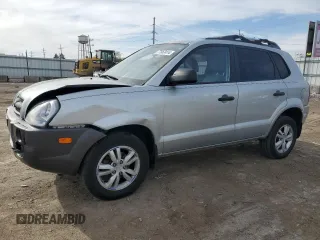 2009 Hyundai Tucson GLS with VIN KM8JM12B79U012399, listed as a Copart auction lot 77663414 with 164,615 mi miles and Salvage Title. Bid and sale history available at carsss.com. Image 1.