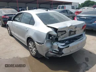 2016 Volkswagen Jetta Sedan 1.4T SE with VIN 3VWD67AJXGM319278, listed as a IAAI auction lot 41954099 with 92,614 mi miles. Bid and sale history available at carsss.com. Image 3.