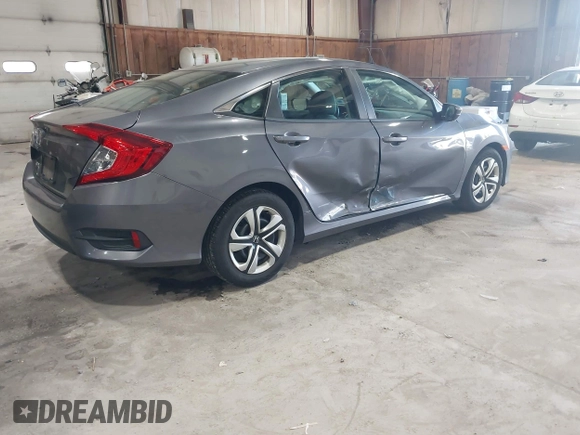 2016 Honda Civic Sedan LX with VIN 19XFC2F58GE214672, listed as a IAAI auction lot 42067792 with 73,929 mi miles. Bid and sale history available at carsss.com. Image 4.