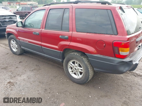 2004 Jeep Grand Cherokee Laredo with VIN 1J4GW48S64C371253, listed as a IAAI auction lot 42099607 with 260,618 mi miles. Bid and sale history available at carsss.com. Image 3.
